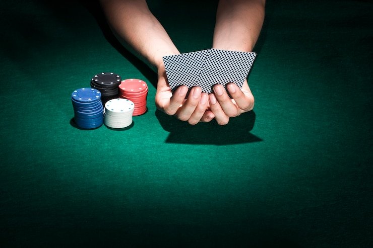 danatoto togel Qiu Qiu live dealer showing two cards dealt at mobile casino table